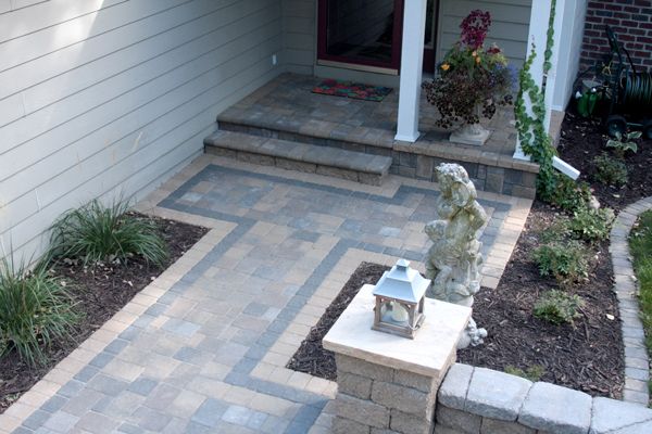Using variously colored pavers makes this front entrance stand out.