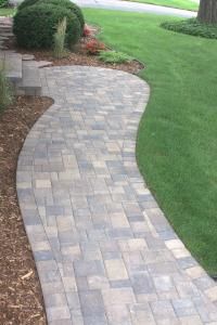 This paver sidewalk is a welcome addition to any front entryway.