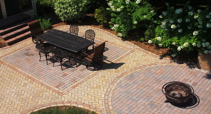 Permeable paving stones make a beautiful outdoor living space that is a stormwater solution.