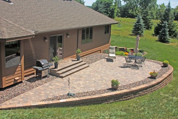 A raised paver patio is a maintenance-free alternataive to an outdoor deck.