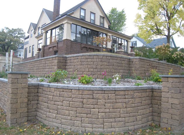 VERSA-LOK segmental retaining walls (SRWs) are a landscaping solution for tiered walls, curved walls, and columns.
